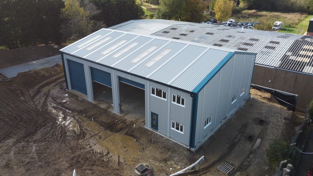 Industrial steel office and vehicle maintenance building in Sevenoaks for N D Brown by Saredon Steel Buildings Ltd.