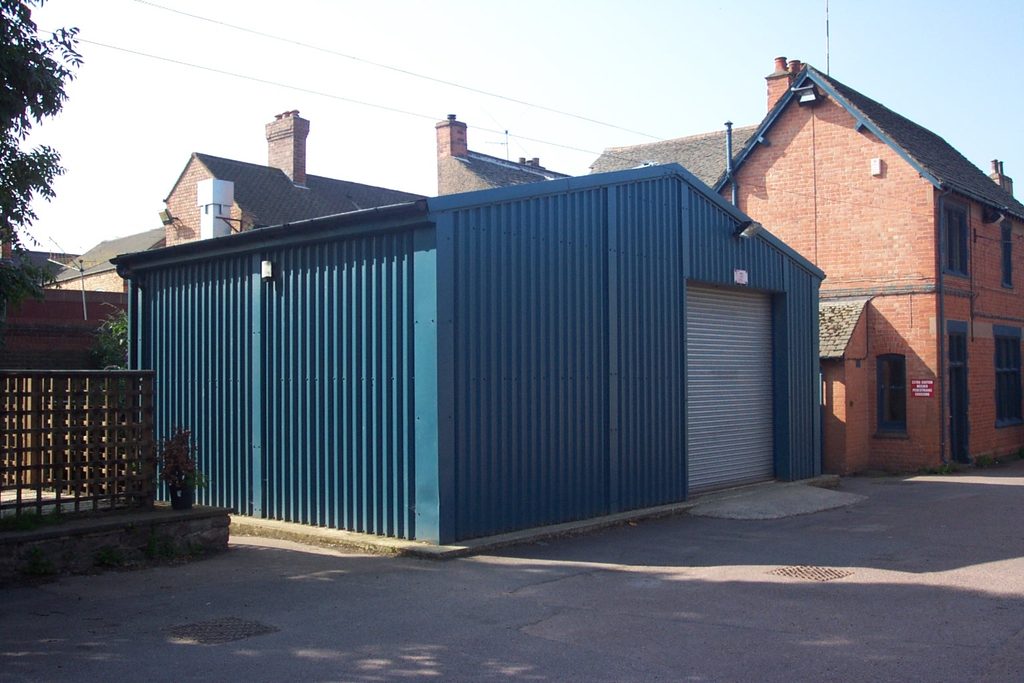 Small blue prefabricated workshop for Trans Air
