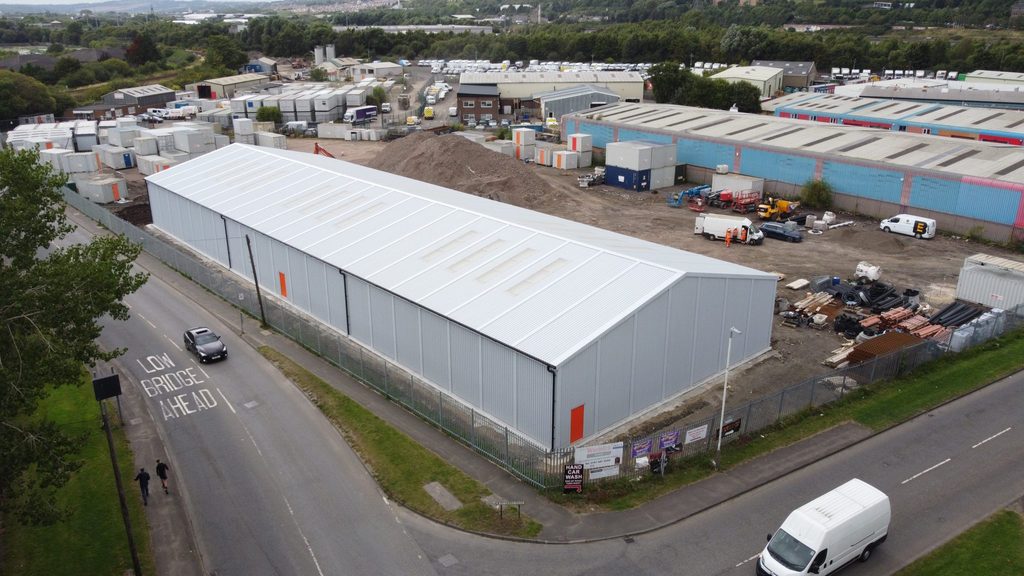Large steel industrial warehouse with multiple loadings bays for Wernick Dunston in Gateshead.